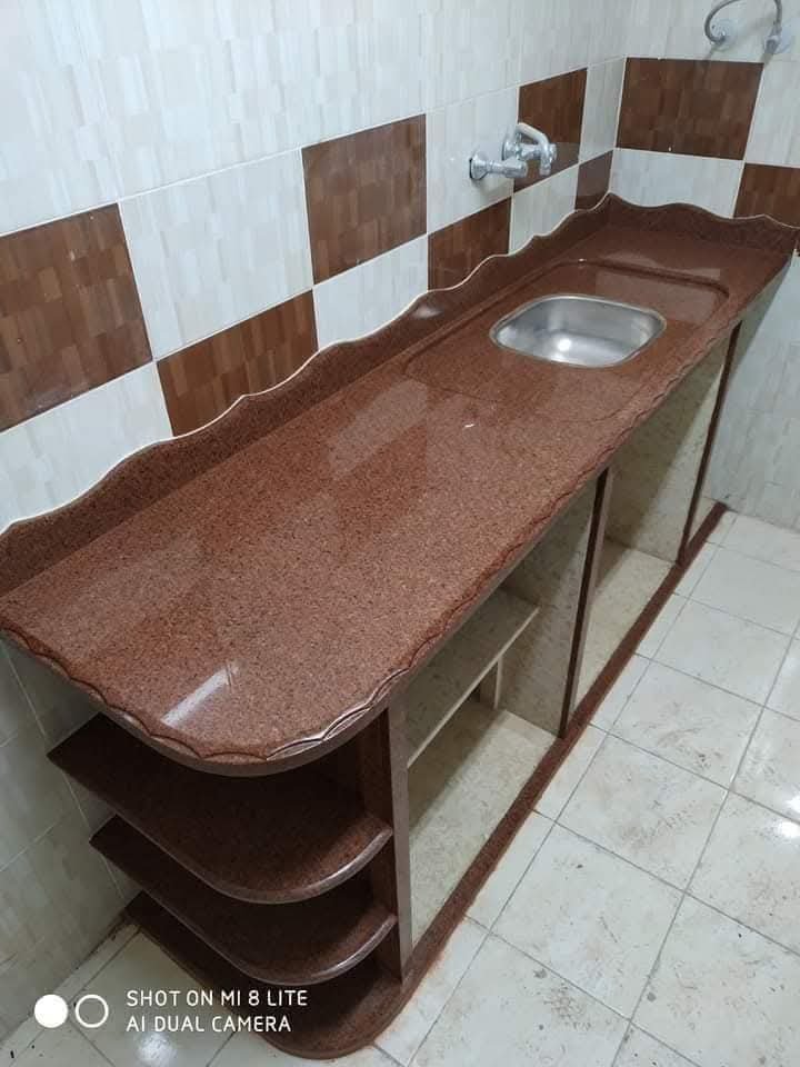 ✨ حصرياً: كونترتوب المطبخ "الجرانيت الإمبراطوري الأحمر" الفاخر 👑 بتصميم حافة مموجة 🌊! المقاوم للحرارة والخدش، مع حوض ستانلس ستيل مدمج. تفصيل يدوي يجسد فخامة الطبيعة! 💯